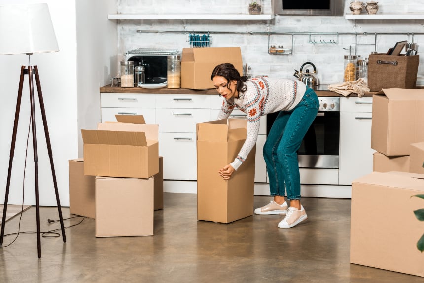 Resident packing items for a move.